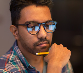 Photo of man pondering his situation