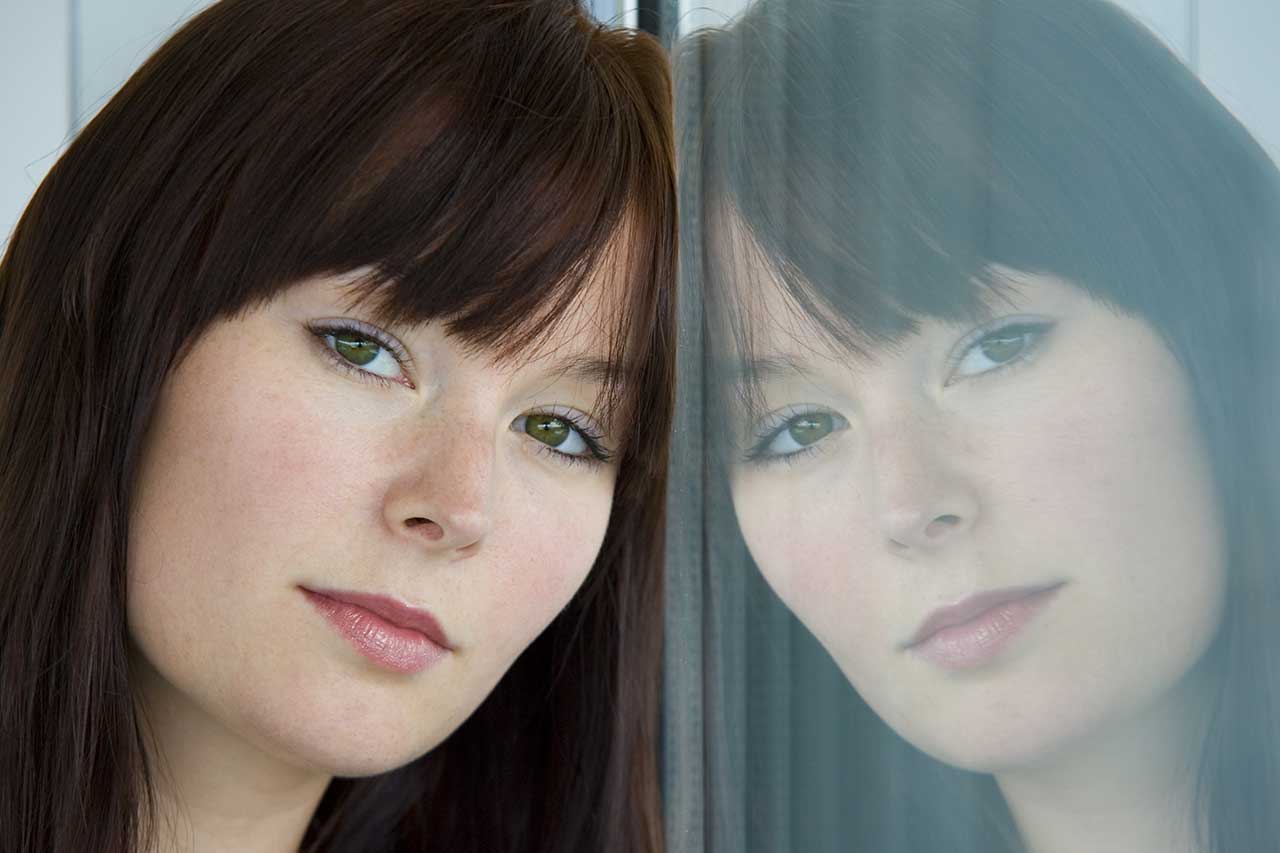 Photo depicting reflections in the mirror, which is the title of the section.