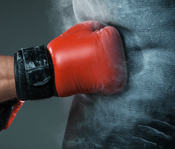 Photo of boxing gloves to depict AFSA's research-funding role in fighting back against neglect of fibromyalgia patients.