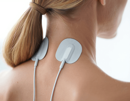 Photo illustrating the placement of TENS pads, which was done in the physical therapy exercise program for fibromyalgia patients.