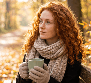 Woman with fibromyalgia wondering how to handle the cold, damp weather of autumn.